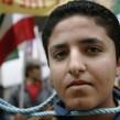 Members of the National Council of Resistance for Iran depict a public hanging